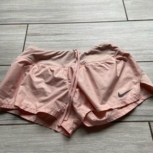 Salmon pink Nike shorts
